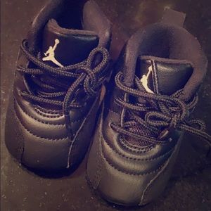 Jordan 12's all black size 2c